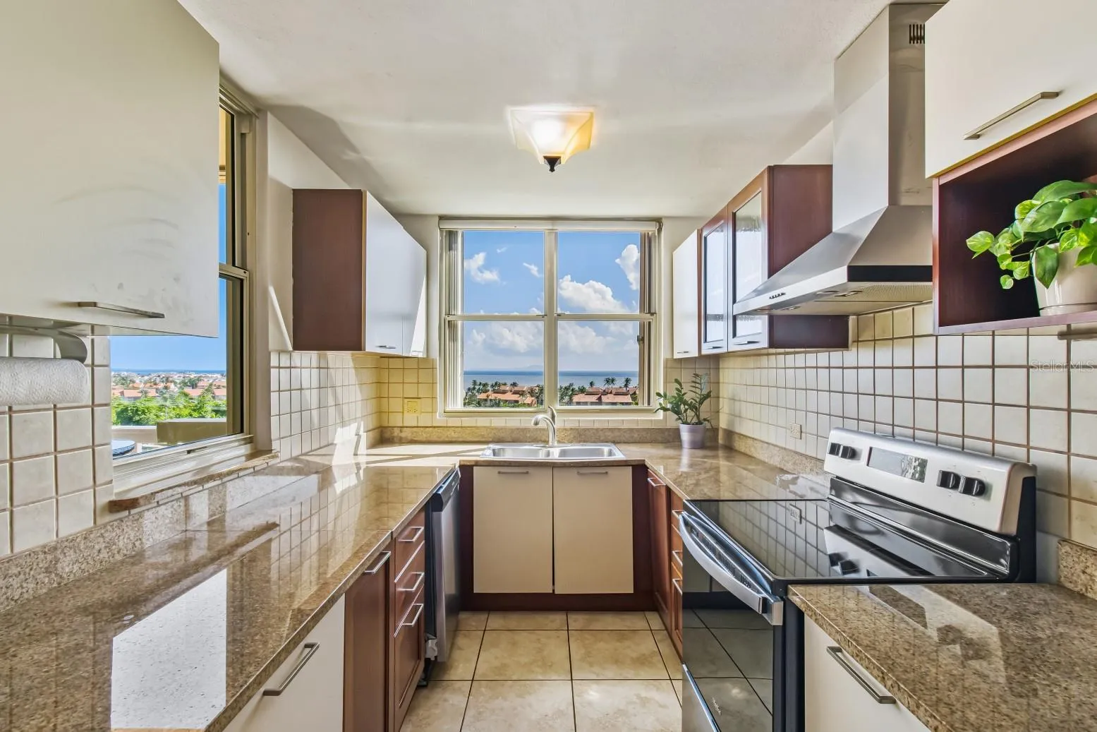 Palmanova Village PH 4-303 | Main Level Kitchen Ocean View