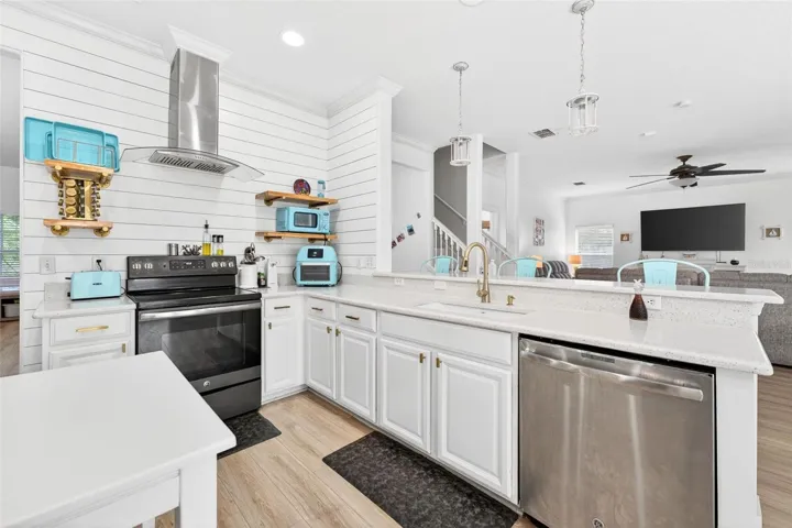 Luxury vinyl flooring is easy to clean and eases the strain of standing on cold hard tile