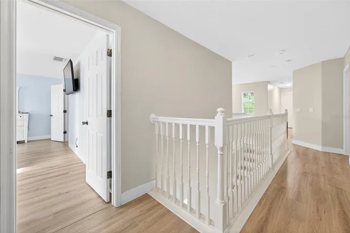 Staircase is tucked out of the way