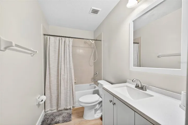 One of two upstairs hall baths