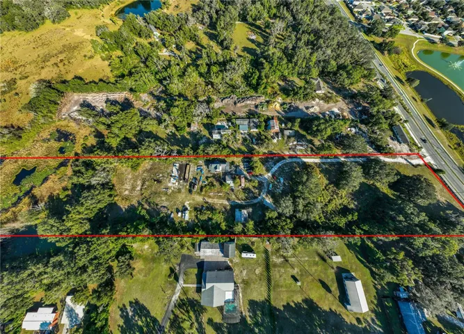 Property Line View from Clarcona Ocoee Rd to Lake Alpharetta at the Back of the Property