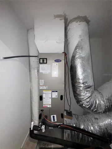 Separate Utilities Closet for Carrier Air Handler, keeping your equipment cooler in climate controlled area.