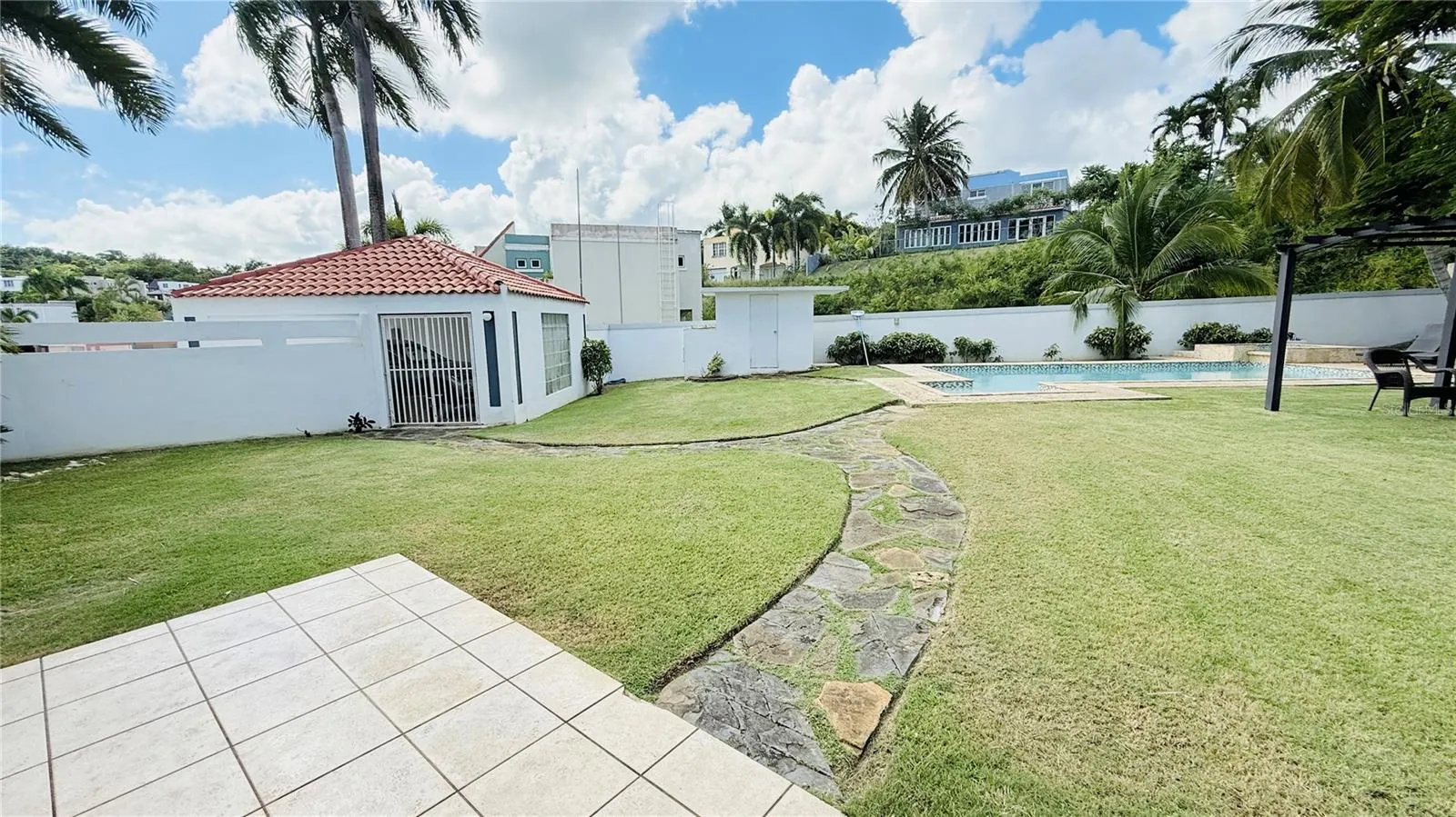 LEFT SIDE OF THE BACKYARD