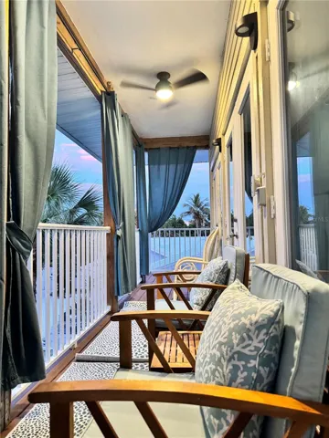 Balcony on Apt Entry. Covered in curtains.