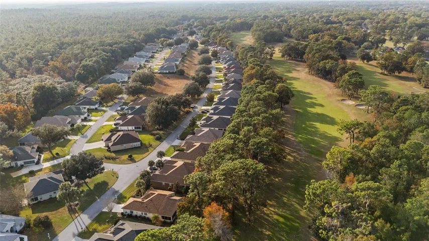 Aerial view showing backyard view of golf course