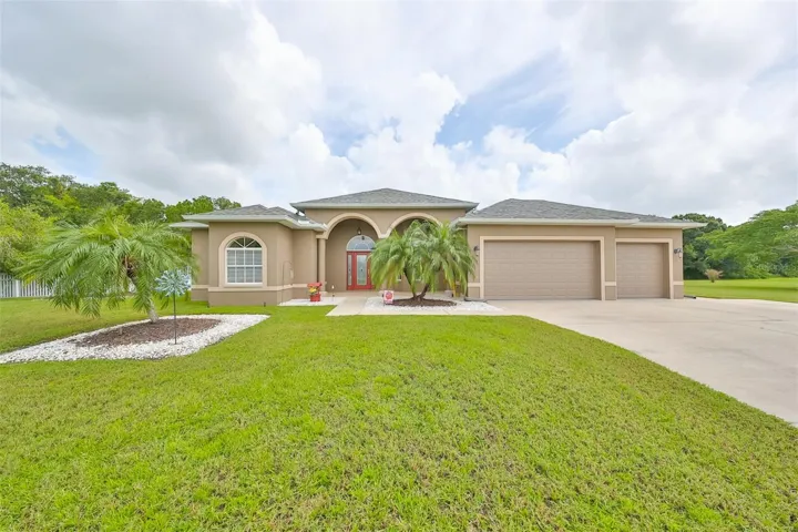 extra deep 3 car garage and large driveway