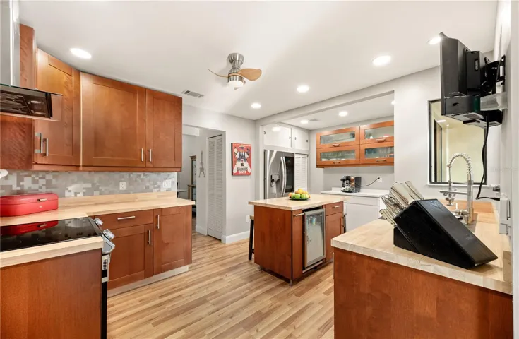 Gourmet kitchen with custom cabinets