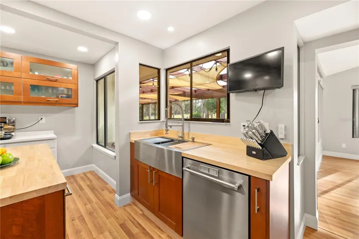 Kitchen with view of lanai and golf course