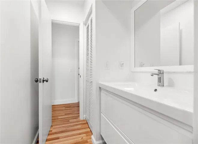 Second full bathroom in the hallway with third bedroom