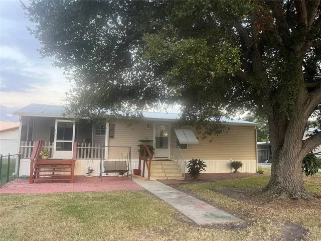 FROM FRONT DRIVEWAY "LOOKING" IN