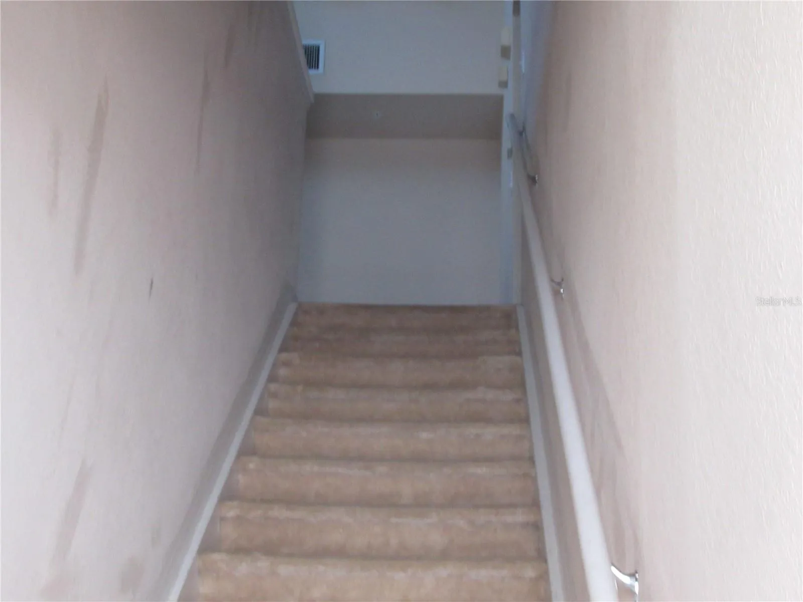 Stairs to second floor where all the rooms are