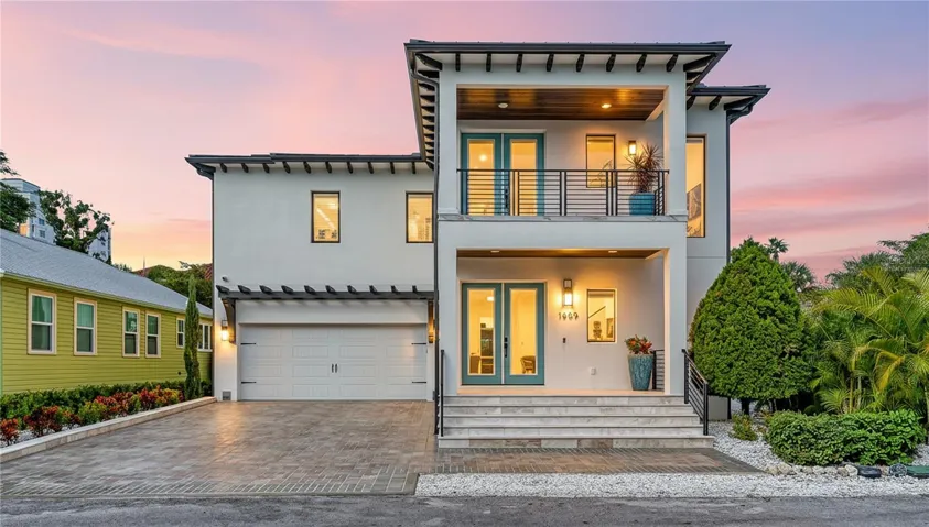 Twilight view front of house. Virtually staged