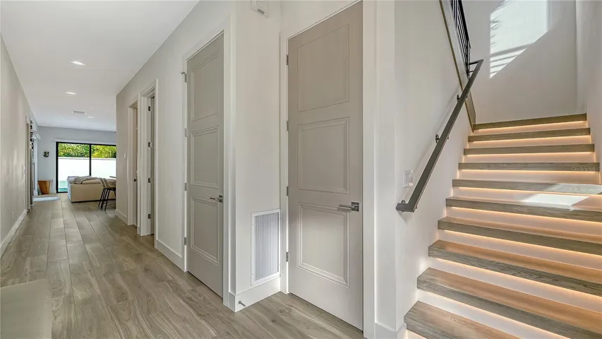 Front entry and lighted staircase