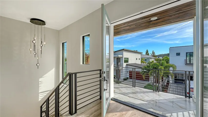 Upstairs front Balcony with view of neighorhood. Great for watching the morning sunrise with your coffee.
