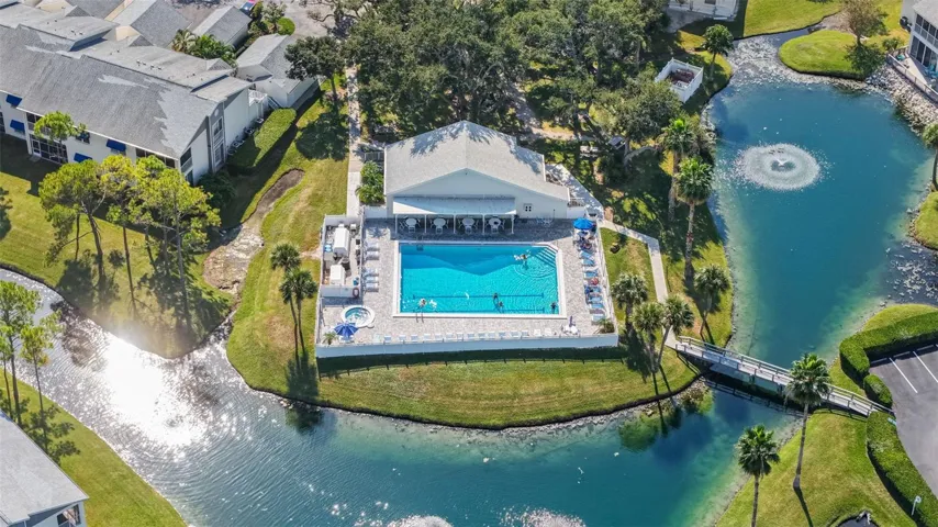 2nd Clubhouse heated pool with walking trails.