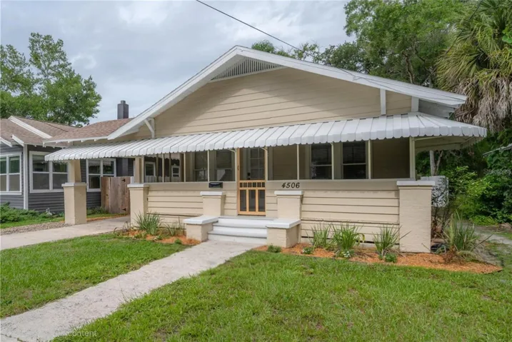 Front view including car port.