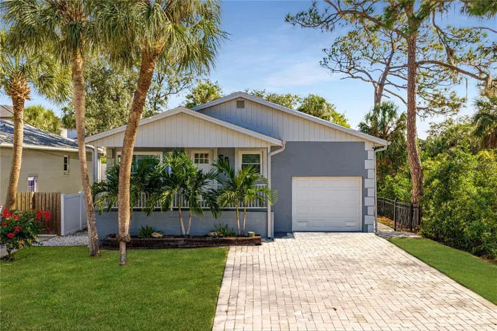 Charming pool home with paved driveway