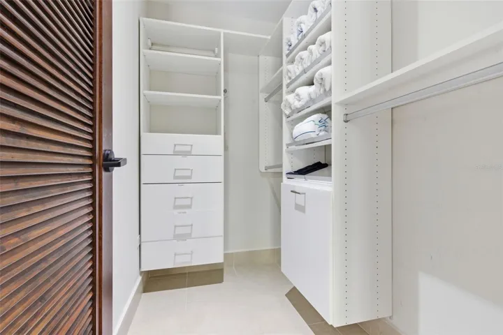 The bedrooms are designed with abundant storage and spacious walk-in closets.