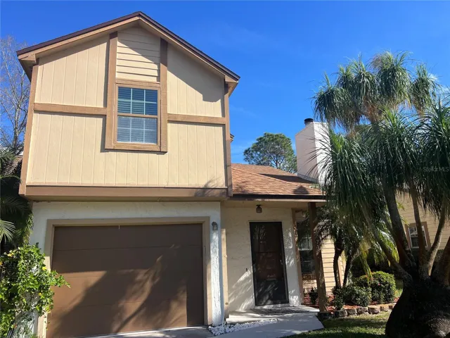 Beautiful 2 Story End Unit with Exotic PONYTAIL PALM Trees!