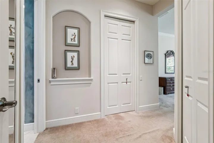 Entry into Primary Bedroom w/ 2 walk-in closets