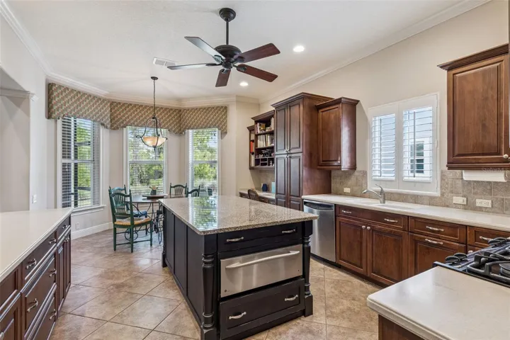 Center island with a built-in warming door & sliding drawers