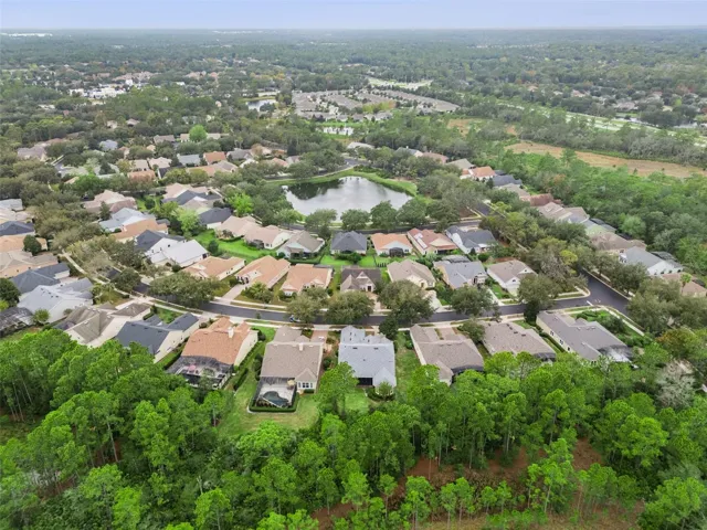 Aerial view of the surrounding neighborhood area by the home