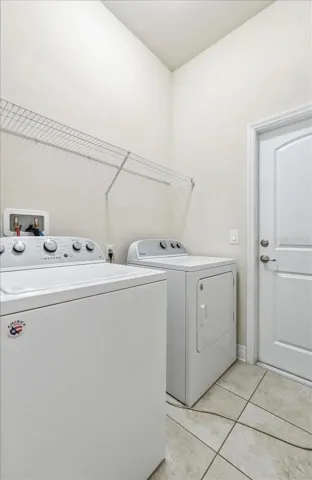 Laundry room with access to the 2 car garage.