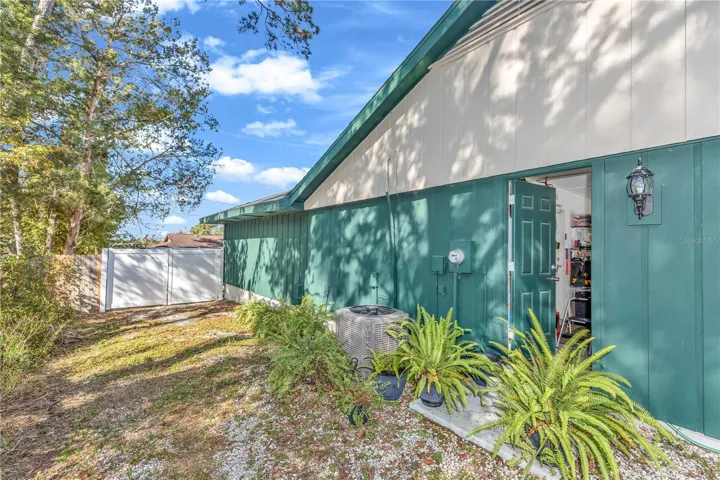 Side yard with garage entrance