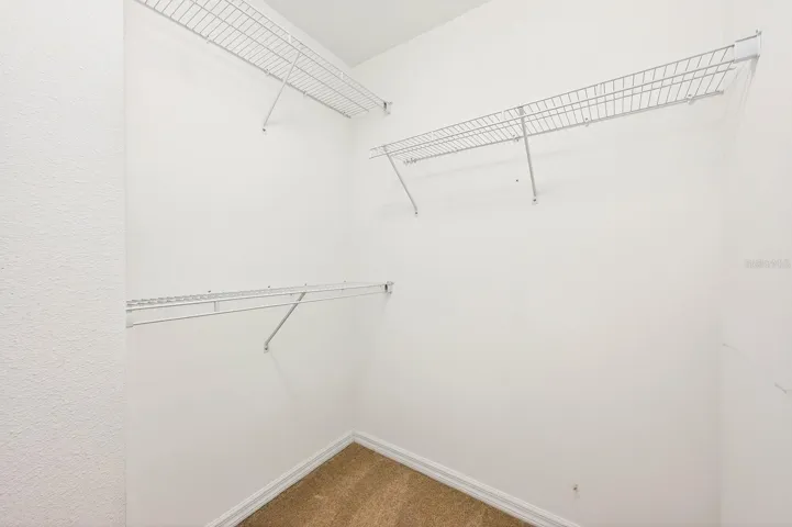 The Primary Suite walk-in closet