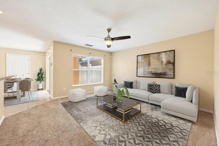 the Kitchen overlooks the Family Room so you're always part of the conversation. Virtually Staged