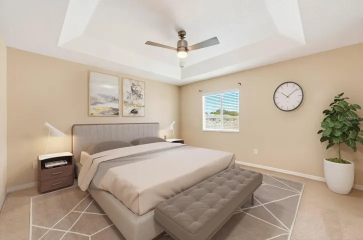 The spacious Primary Suite serves as a relaxing retreat with an ELEGANT TRAY CEILING, walk-in closet, and private en suite bath. Virtually Staged