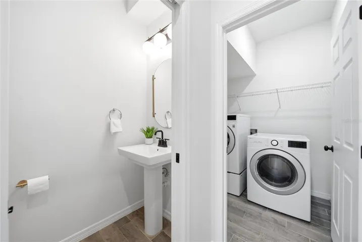 half bathroom off of garage and laundry room