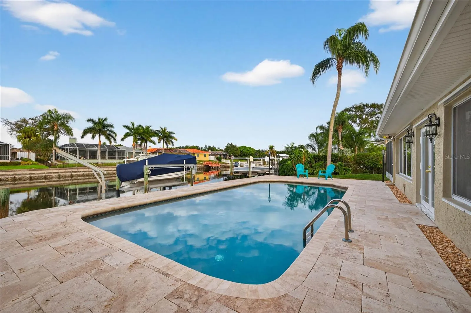 Beautiful resurfaced pool and travertine deck