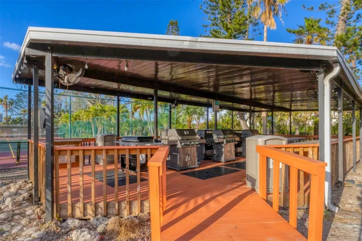The property also offers an outdoor kitchen with several grills