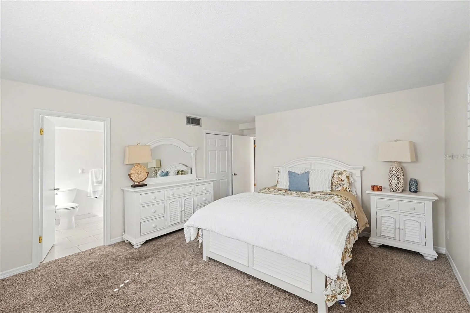 Second level primary bedroom with ensuite bath.