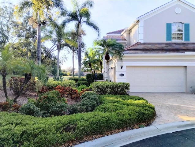 The last condo home in Botanica with INCOMPARABLE landscaping, lake views and privacy, even in the beautiful community of Botanica!