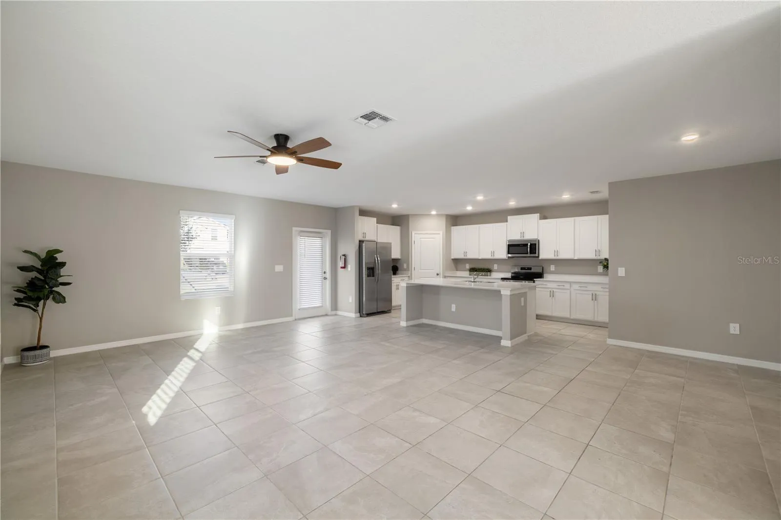 Primary Living Area with Open Kitchen and Dinning
