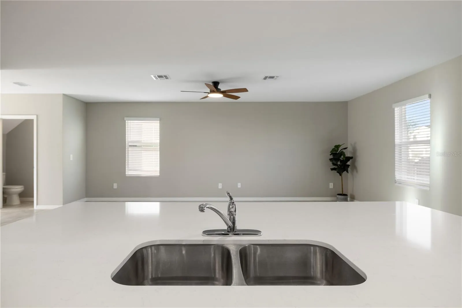 Kitchen facing the open living area