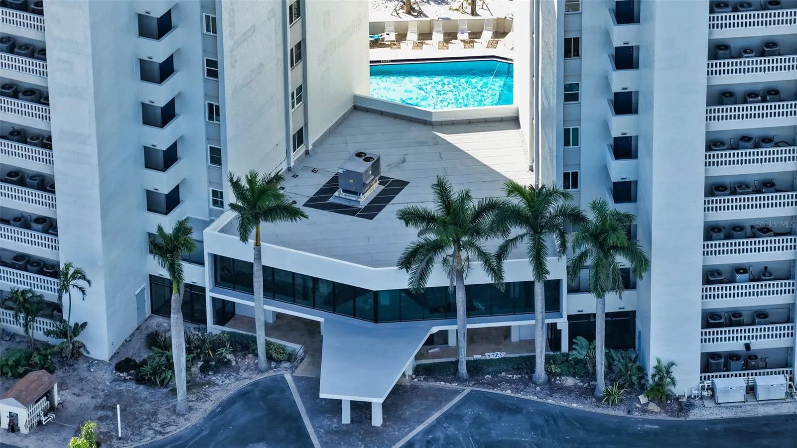 Aerial view of the heated beachside pool, the 2nd of two pools on the property.