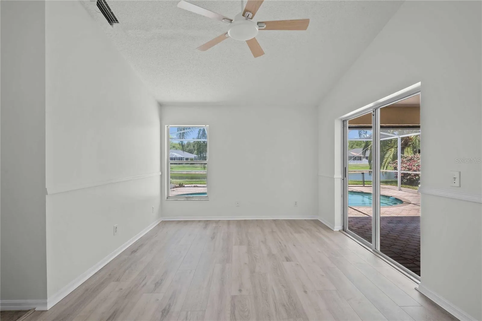 Primary Room - New Flooring, New Professional Paint, New Ceiling Fan