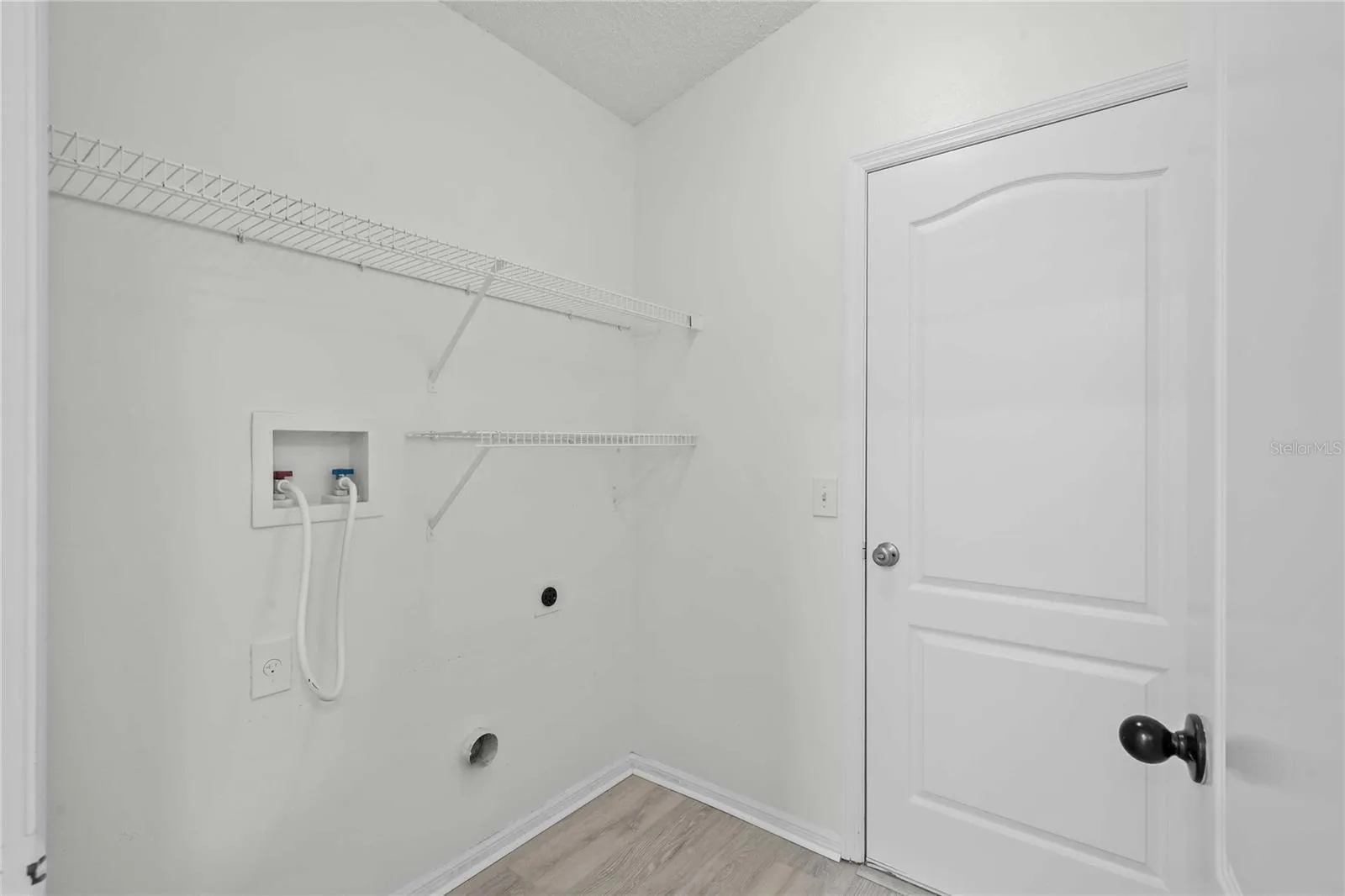 Inside Laundry Room - New Flooring, New Professional Paint, New Recessed Lighting.