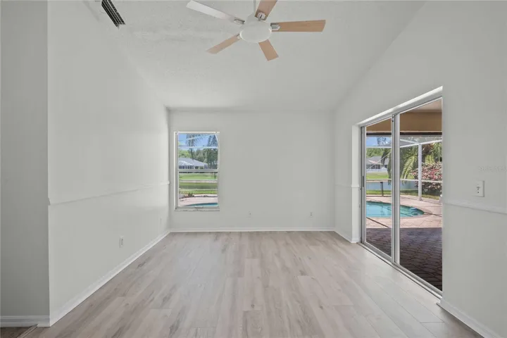 Primary Room - New Flooring, New Professional Paint, New Ceiling Fan