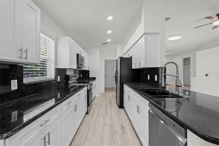 Kitchen Remodel with New Cabinets, New Recessed Lighting, New Flooring, New Paint