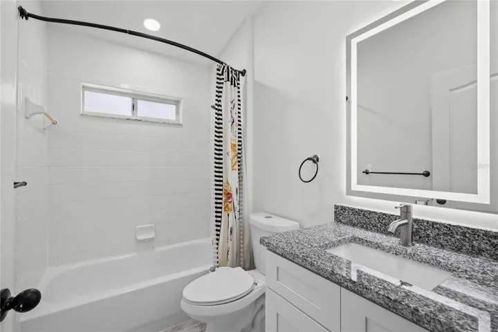Full Bathroom - REMODELED; New Vanity & Granite Countertops; New Mirrors/Fixtures