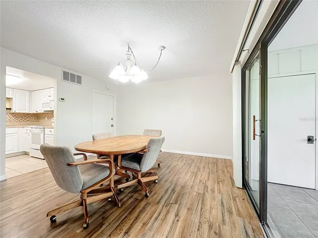 Large Double Sliders out to Enclosed Porch