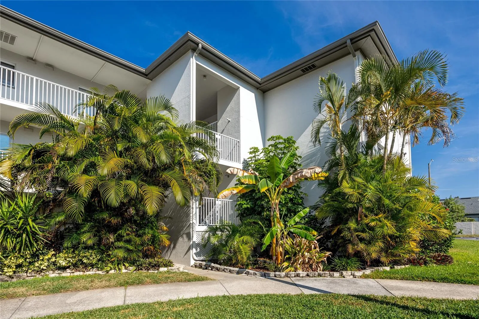 Stairs up to the condo. Front door is just around the corner on the right.