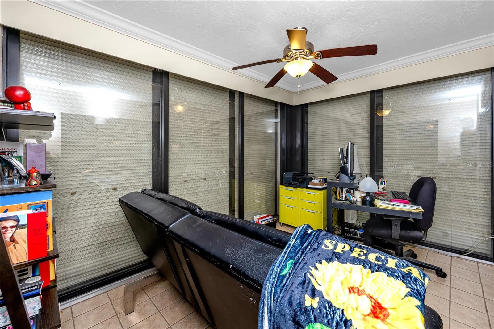 Screened in porch with hurricane shutters