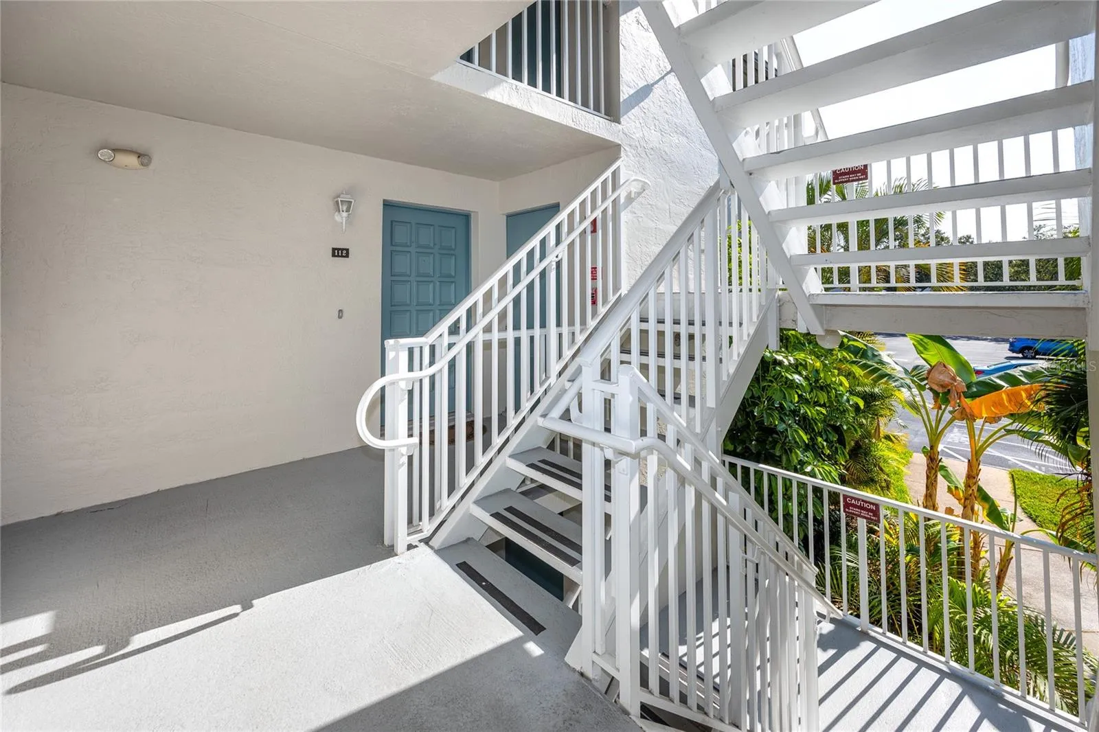 Front door, with storage room to the right of the front door.