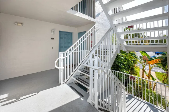 Front door, with storage room to the right of the front door.