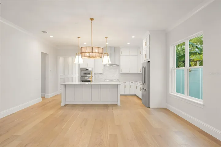 Beautiful view  of the kitchen and dining room.